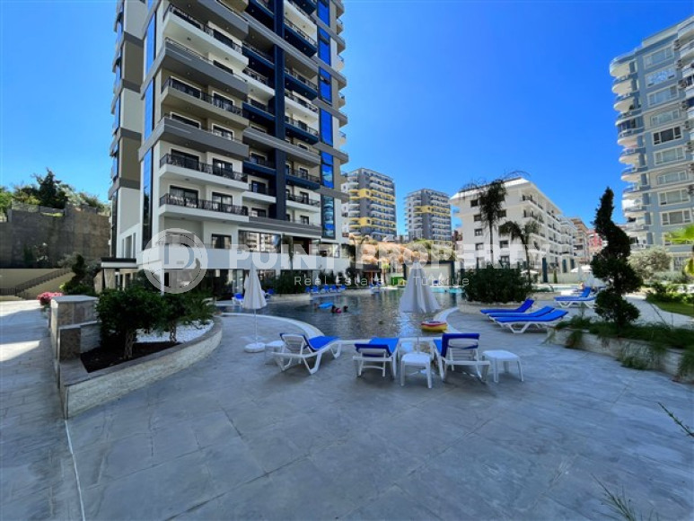 Апартаменты 1+1, 56м2 в популярном районе Махмутлар. До моря 750 метров.-id-2081-фото-5