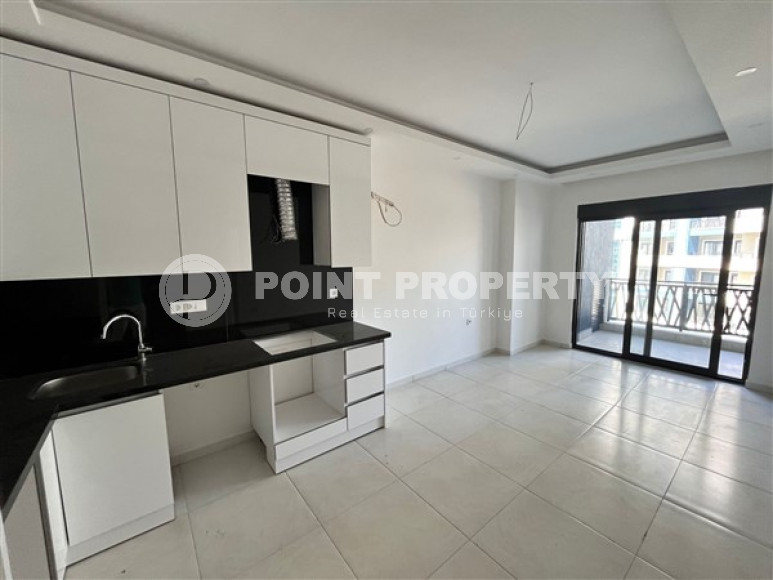 Апартаменты 1+1, 56м2 в популярном районе Махмутлар. До моря 750 метров.-id-2081-фото-14