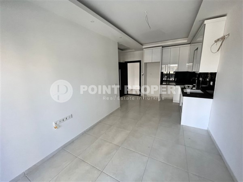 Апартаменты 1+1, 56м2 в популярном районе Махмутлар. До моря 750 метров.-id-2081-фото-17