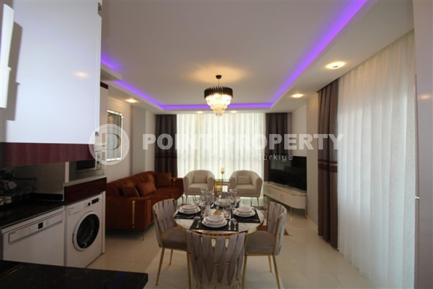 Апартаменты с мебелью 1+1, 70м2 в открытом для получения ВНЖ районе Алании, в Тосмуре. До моря 250 метров.-id-2083-фото-2