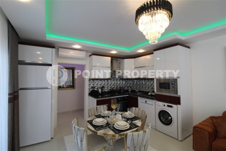 Апартаменты с мебелью 1+1, 70м2 в открытом для получения ВНЖ районе Алании, в Тосмуре. До моря 250 метров.-id-2083-фото-9