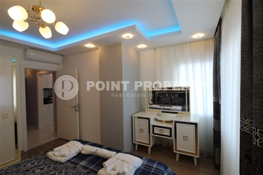 Апартаменты с мебелью 1+1, 70м2 в открытом для получения ВНЖ районе Алании, в Тосмуре. До моря 250 метров.-id-2083-фото-29