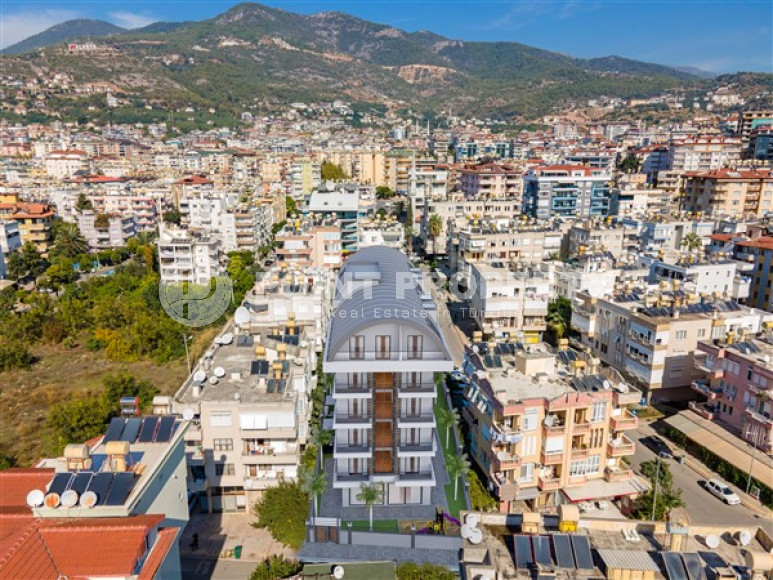 Двухкомнатная квартира, 55м², в комплексе на этапе строительства в центре Алании, 150м от пляжа Кейкубат-id-2087-фото-6