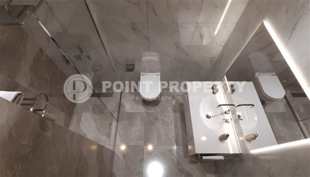 Двухкомнатная квартира, 55м², в комплексе на этапе строительства в центре Алании, 150м от пляжа Кейкубат-id-2087-фото-18