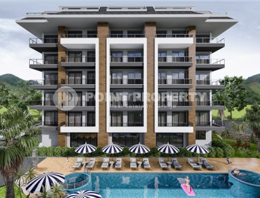 Квартиры разных планировок, 62-135м², в строящемся комплексе, в 550м от моря в районе Тосмур, Алания-id-2096-фото-2