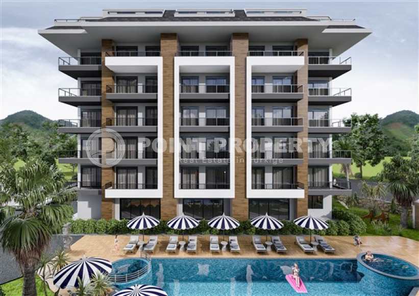 Apartments of different layouts, 62-135m², in a complex under construction, 550m from the sea in the Tosmur area, Alanya-id-2096-photo-2