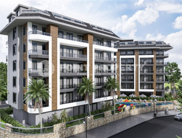 Квартиры разных планировок, 62-135м², в строящемся комплексе, в 550м от моря в районе Тосмур, Алания-id-2096-фото-3