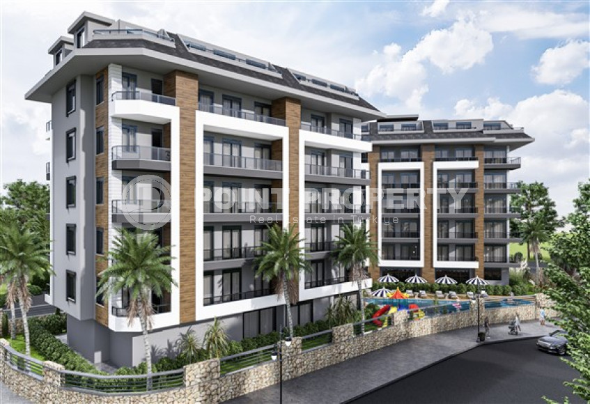 Apartments of different layouts, 62-135m², in a complex under construction, 550m from the sea in the Tosmur area, Alanya-id-2096-photo-3