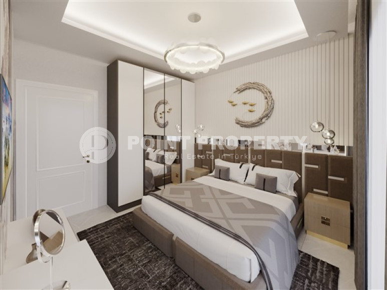 Apartments of different layouts, 62-135m², in a complex under construction, 550m from the sea in the Tosmur area, Alanya-id-2096-photo-40