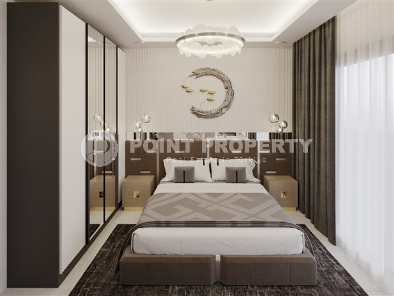 Apartments of different layouts, 62-135m², in a complex under construction, 550m from the sea in the Tosmur area, Alanya-id-2096-photo-42