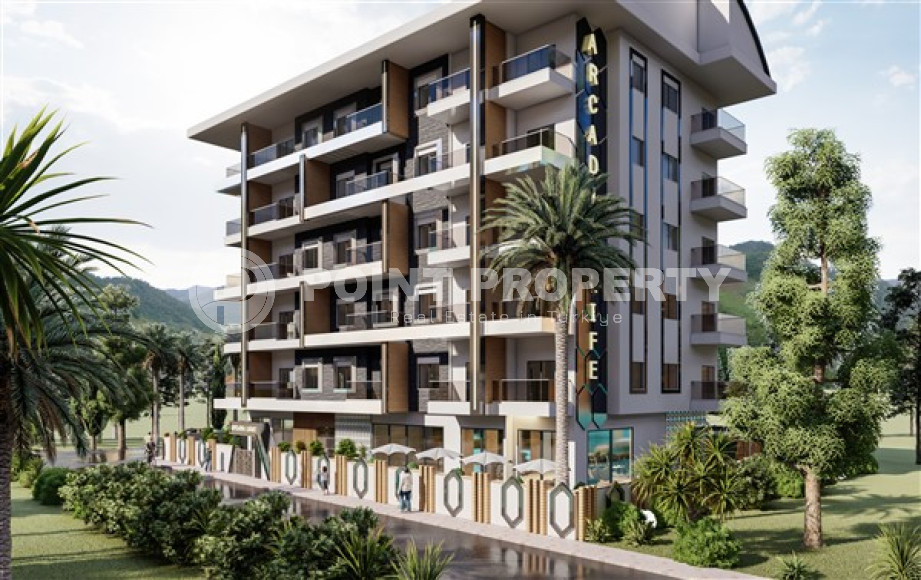 New investment project with 1+1 and 2+1 apartments in Mahmutlar with developed infrastructure 650 meters from the sea coast.-id-1160-photo-2