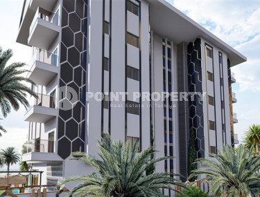 Новый инвестиционный проект с апартаментами 1+1 и 2+1 в Махмутларе с развитой инфраструктурой в 650 метрах от морского побережья.-id-1160-фото-4