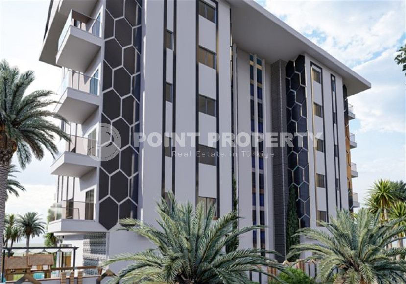 New investment project with 1+1 and 2+1 apartments in Mahmutlar with developed infrastructure 650 meters from the sea coast.-id-1160-photo-4