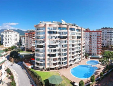 Spacious three-room apartment, 120m², in a cozy residence 550m from the sea in Alanya Tosmur-id-2104-photo-1