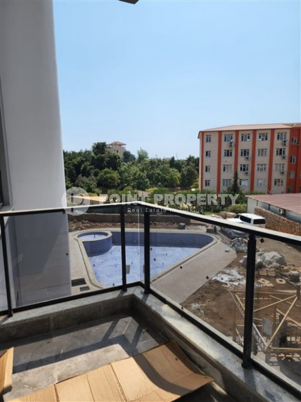 One-room apartment, 56 m², fully finished in a cozy complex with infrastructure in the Oba area.-id-2105-photo-31