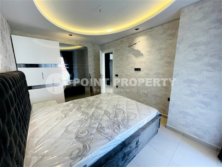 Просторная меблированная двухкомнатная квартира,65м², в центре Махмутлара, в 300м от побережья-id-2106-фото-9