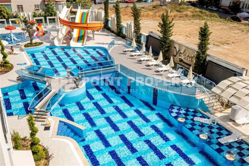 Three-bedroom apartment, 180 m², in an elite complex in Mahmutlar, 350 meters from the sea.-id-2111-photo-39