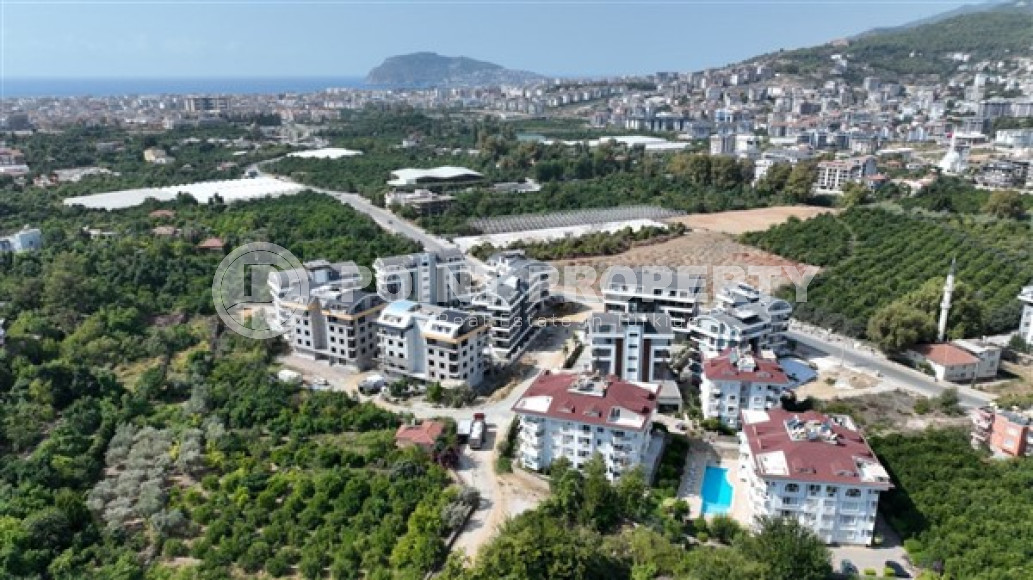 Well-kept two-bedroom apartment, 110m², at the foot of the Toros Mountains in Alanya - Upper Oba-id-2130-photo-4