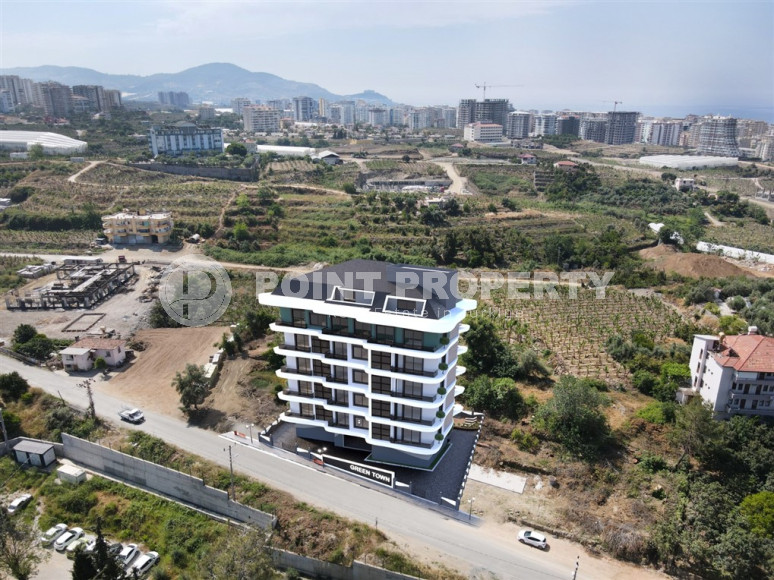 Comfortable apartments with layouts 1+1, 2+1 and duplexes with layouts 2+1, 3+1 from the developer in a new investment project in the center of Mahmutlar-id-1168-photo-10