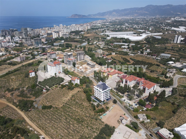 Comfortable apartments with layouts 1+1, 2+1 and duplexes with layouts 2+1, 3+1 from the developer in a new investment project in the center of Mahmutlar-id-1168-photo-14