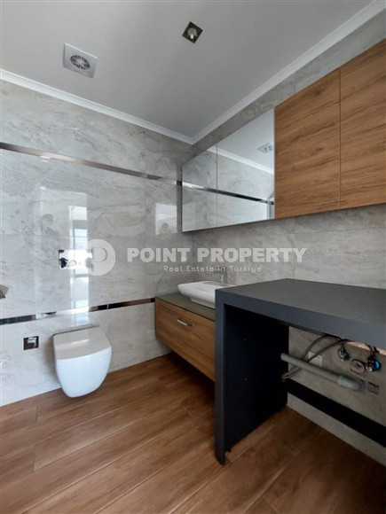 Two bedroom apartment, 115m², with separate kitchen in a new residence in Alanya - Oba-id-2136-photo-9