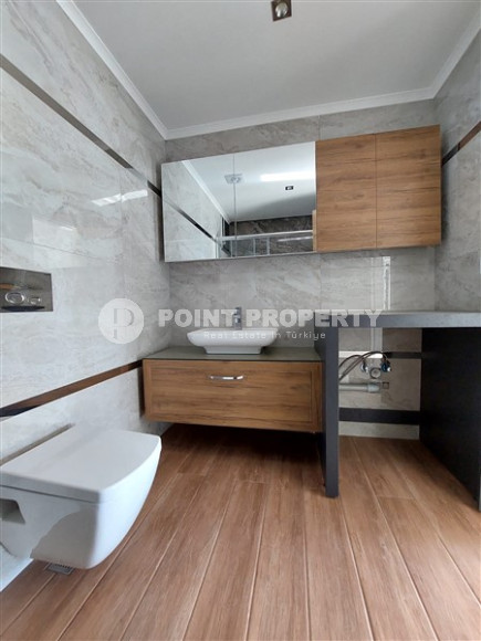 Two bedroom apartment, 115m², with separate kitchen in a new residence in Alanya - Oba-id-2136-photo-10