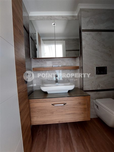 Two bedroom apartment, 115m², with separate kitchen in a new residence in Alanya - Oba-id-2136-photo-16