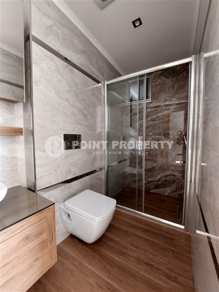 Two bedroom apartment, 115m², with separate kitchen in a new residence in Alanya - Oba-id-2136-photo-18