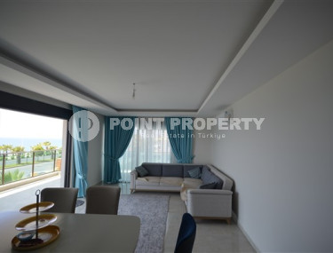 Просторные двухкомнатные апартаменты площадью 80 м2, на первой береговой линии в районе Махмутлар-id-2144-фото-2