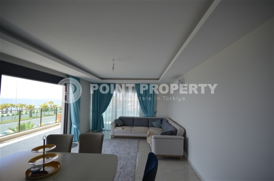 Просторные двухкомнатные апартаменты площадью 80 м2, на первой береговой линии в районе Махмутлар-id-2144-фото-2