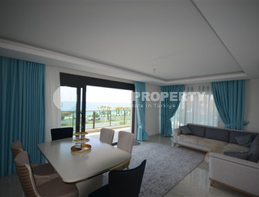 Просторные двухкомнатные апартаменты площадью 80 м2, на первой береговой линии в районе Махмутлар-id-2144-фото-3