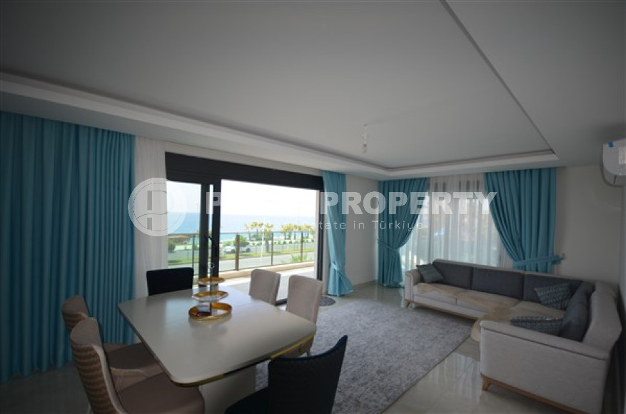 Просторные двухкомнатные апартаменты площадью 80 м2, на первой береговой линии в районе Махмутлар-id-2144-фото-3