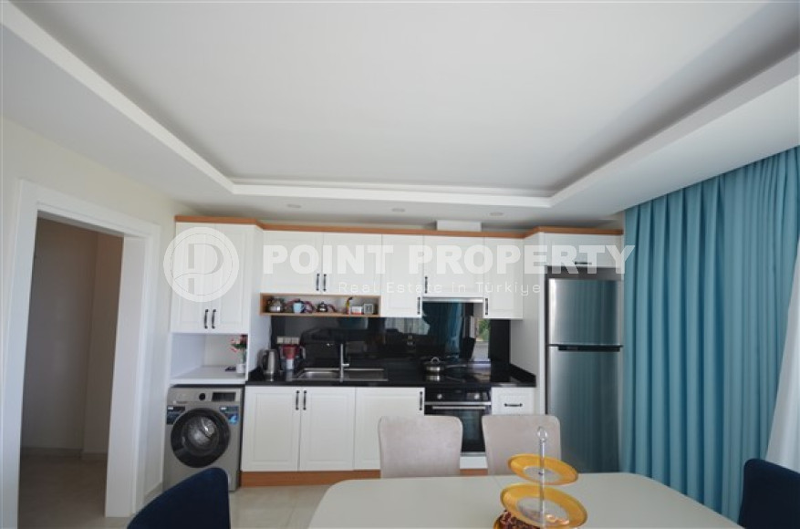 Просторные двухкомнатные апартаменты площадью 80 м2, на первой береговой линии в районе Махмутлар-id-2144-фото-5