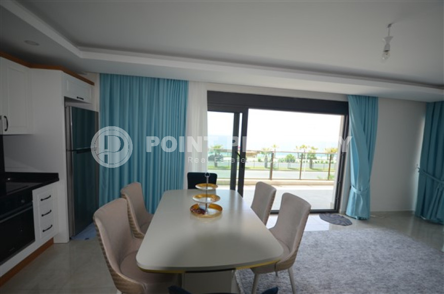 Просторные двухкомнатные апартаменты площадью 80 м2, на первой береговой линии в районе Махмутлар-id-2144-фото-6