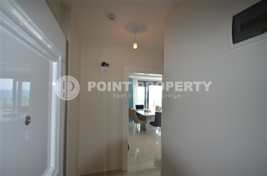 Просторные двухкомнатные апартаменты площадью 80 м2, на первой береговой линии в районе Махмутлар-id-2144-фото-7