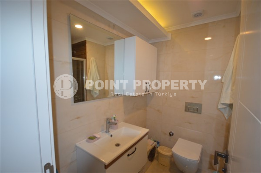 Просторные двухкомнатные апартаменты площадью 80 м2, на первой береговой линии в районе Махмутлар-id-2144-фото-9