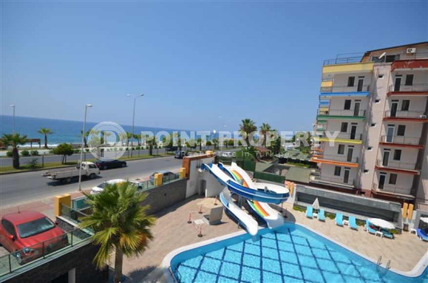 Просторные двухкомнатные апартаменты площадью 80 м2, на первой береговой линии в районе Махмутлар-id-2144-фото-15