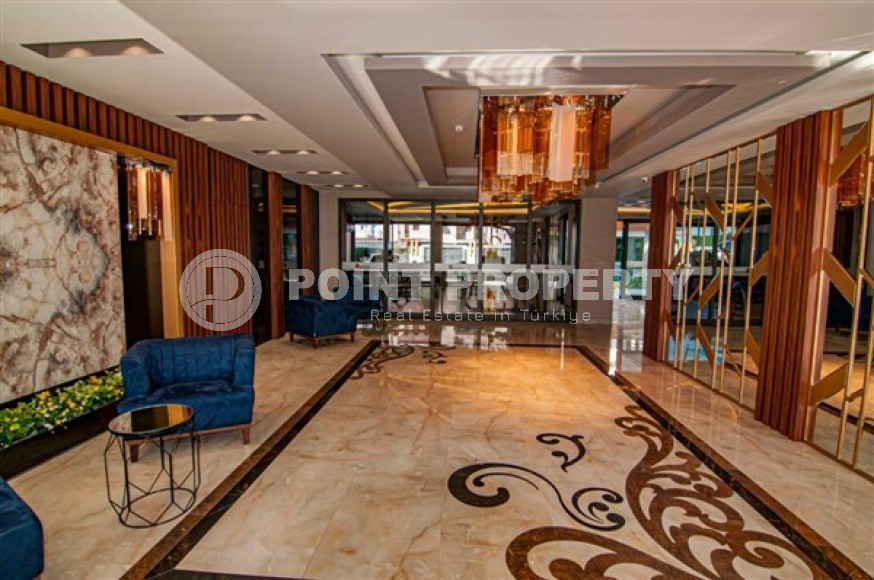 Просторные двухкомнатные апартаменты площадью 80 м2, на первой береговой линии в районе Махмутлар-id-2144-фото-18