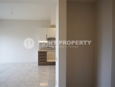 New one-bedroom apartment, 50m², in an elite complex 900m from the sea in Avsallar-id-2149-photo-3