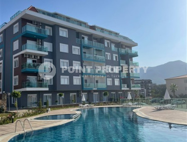 Furnished one bedroom apartment, 60m² in a new complex in Oba, Alanya-id-2151-photo-1