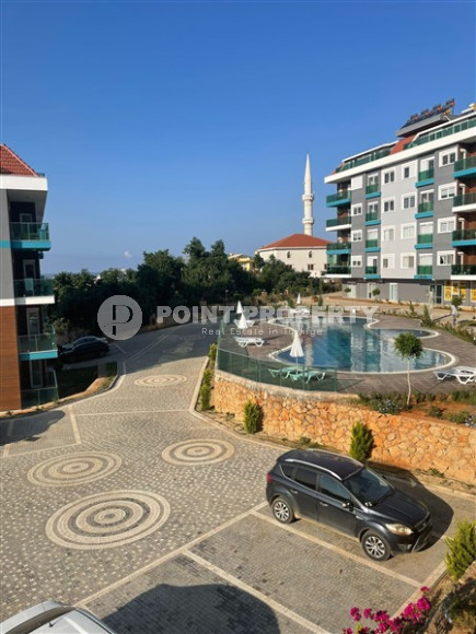 Furnished one bedroom apartment, 60m² in a new complex in Oba, Alanya-id-2151-photo-15