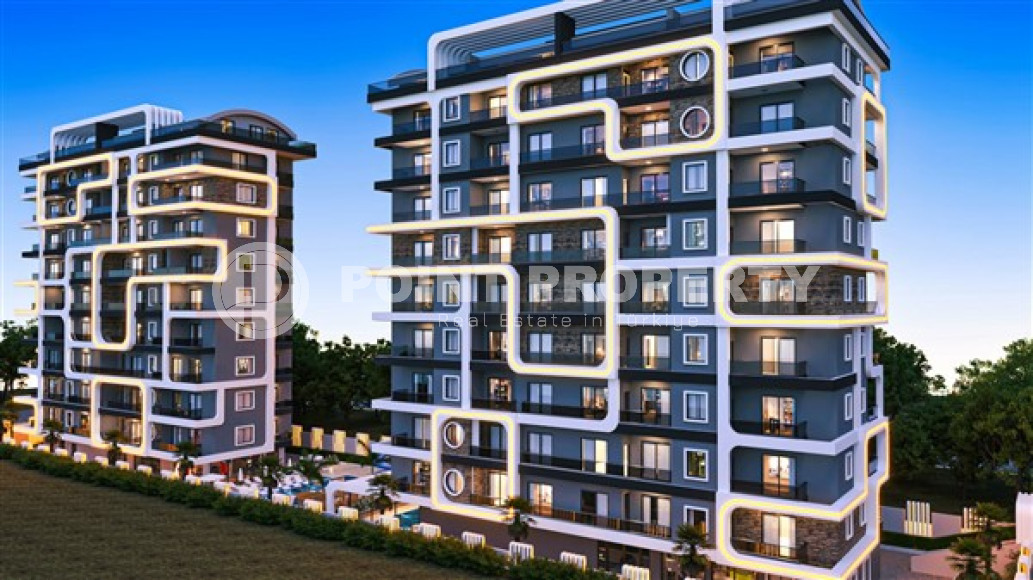 Квартиры, 45-205м², в комплексе на начальном этапе строительства в Махмутларе, Алания, в 200м от моря-id-2153-фото-1