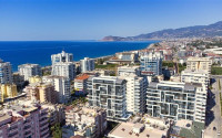 Квартиры, 45-205м², в комплексе на начальном этапе строительства в Махмутларе, Алания, в 200м от моря-id-2153-фото-3
