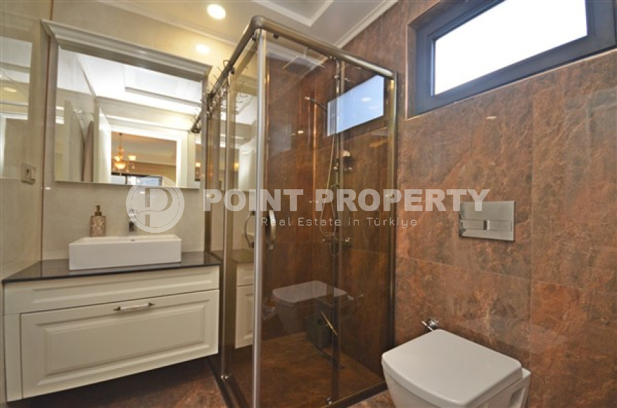 Стильная квартира с двумя спальнями, 115м² в новом элитном комплексе в районе Каргыджак, Алания-id-2159-фото-3