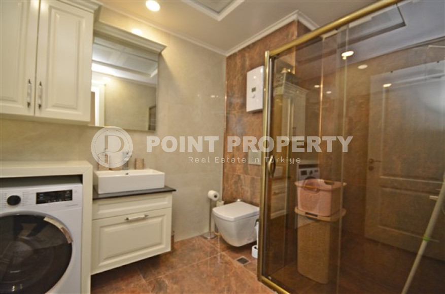 Стильная квартира с двумя спальнями, 115м² в новом элитном комплексе в районе Каргыджак, Алания-id-2159-фото-18