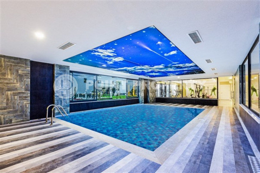 Стильная квартира с двумя спальнями, 115м² в новом элитном комплексе в районе Каргыджак, Алания-id-2159-фото-27