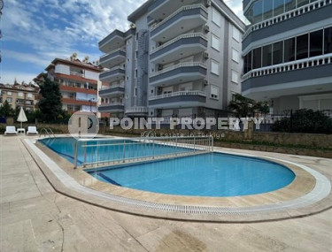 Property in the center of Oba district: three-room furnished apartment, 110 m². 400m from the sea, Alanya.-id-2164-photo-4