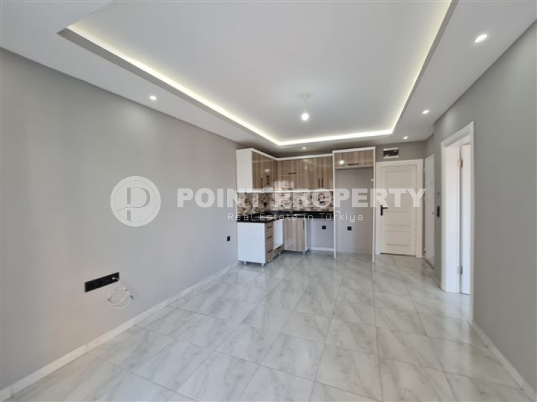 Просторная квартира с одной спальней, 65м², с видом на горы в 750м от моря в Махмутларе, Алания-id-2165-фото-5