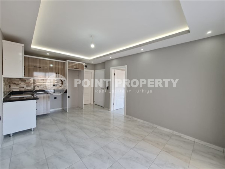 Просторная квартира с одной спальней, 65м², с видом на горы в 750м от моря в Махмутларе, Алания-id-2165-фото-6