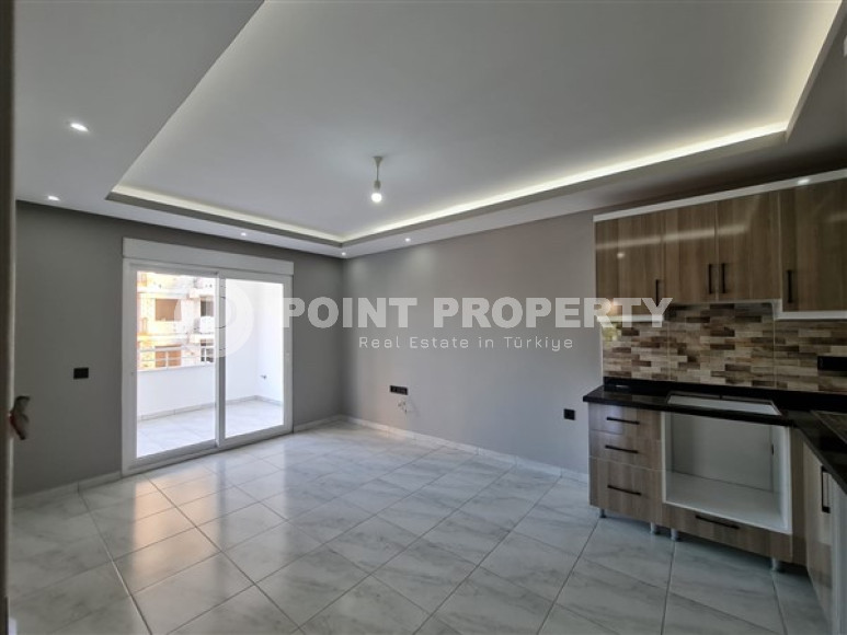 Просторная квартира с одной спальней, 65м², с видом на горы в 750м от моря в Махмутларе, Алания-id-2165-фото-7